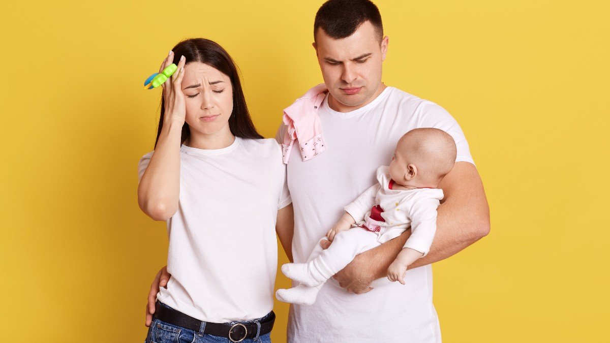 1896800104 couple baby family jpg