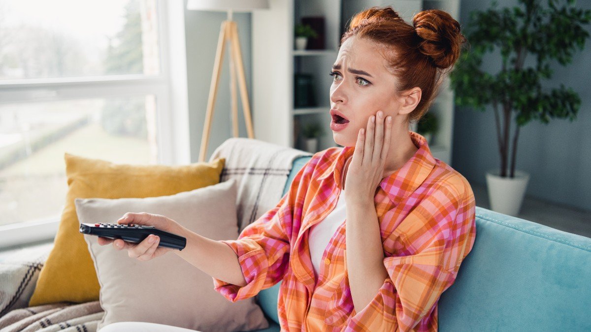 2440389053 watching tv news shocked jpg