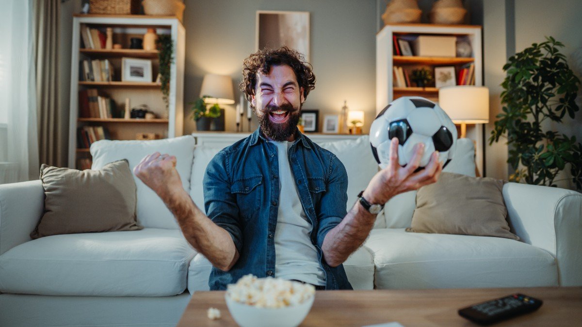 2723228141 watching football game jpg