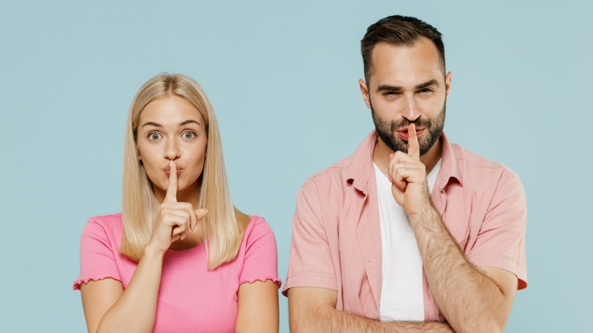 couple secret shutterstock 2136010047 jpg