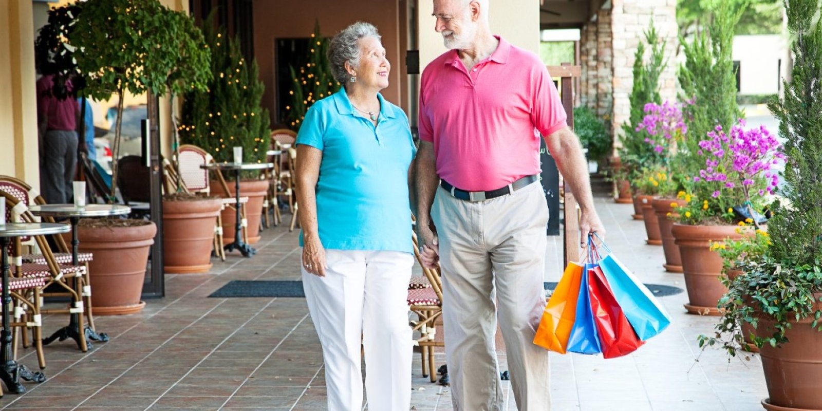109839011 old couple walking shopping jpg