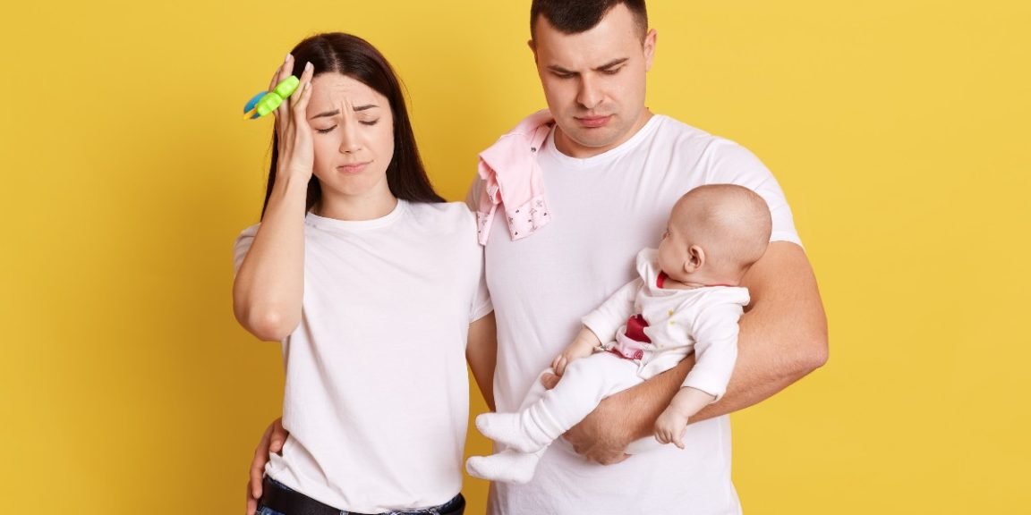 1896800104 couple baby family jpg