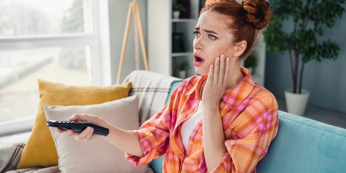 2440389053 watching tv news shocked jpg