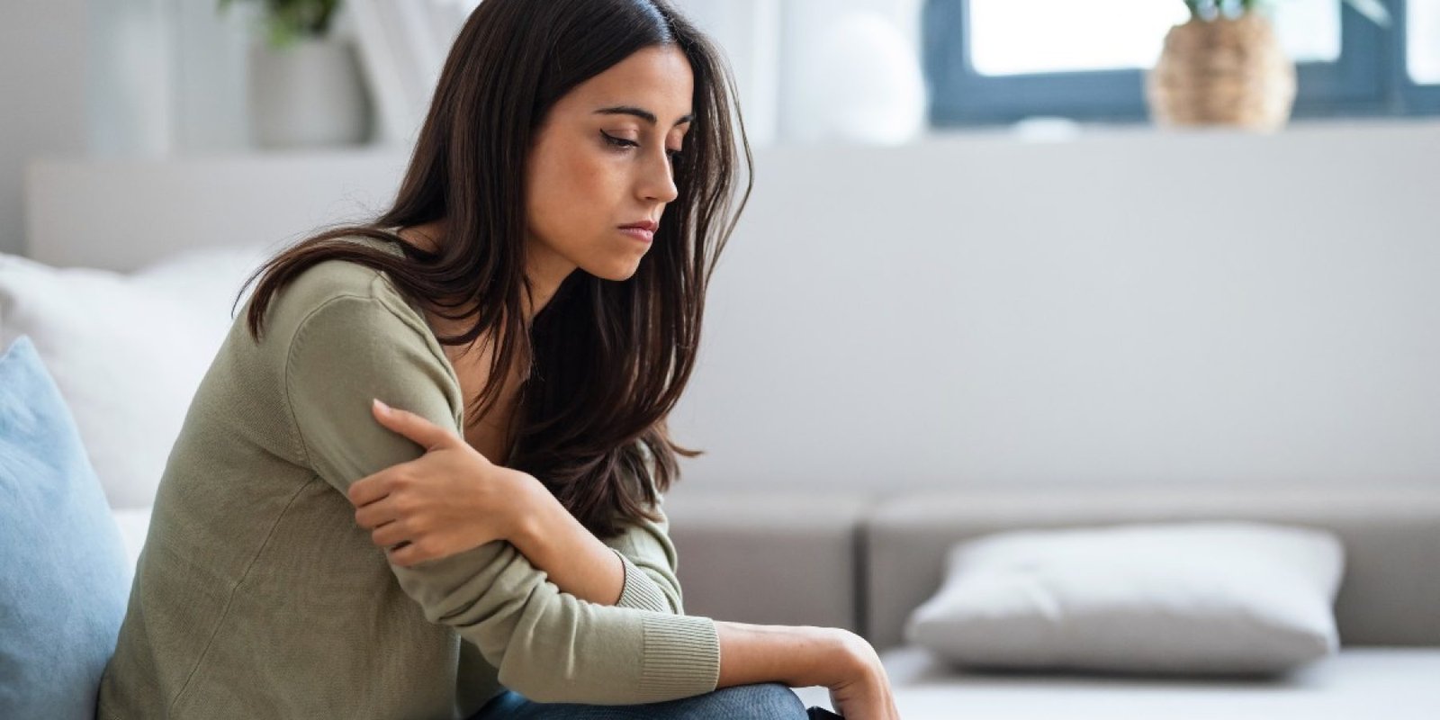 2509056421 worried young woman jpg