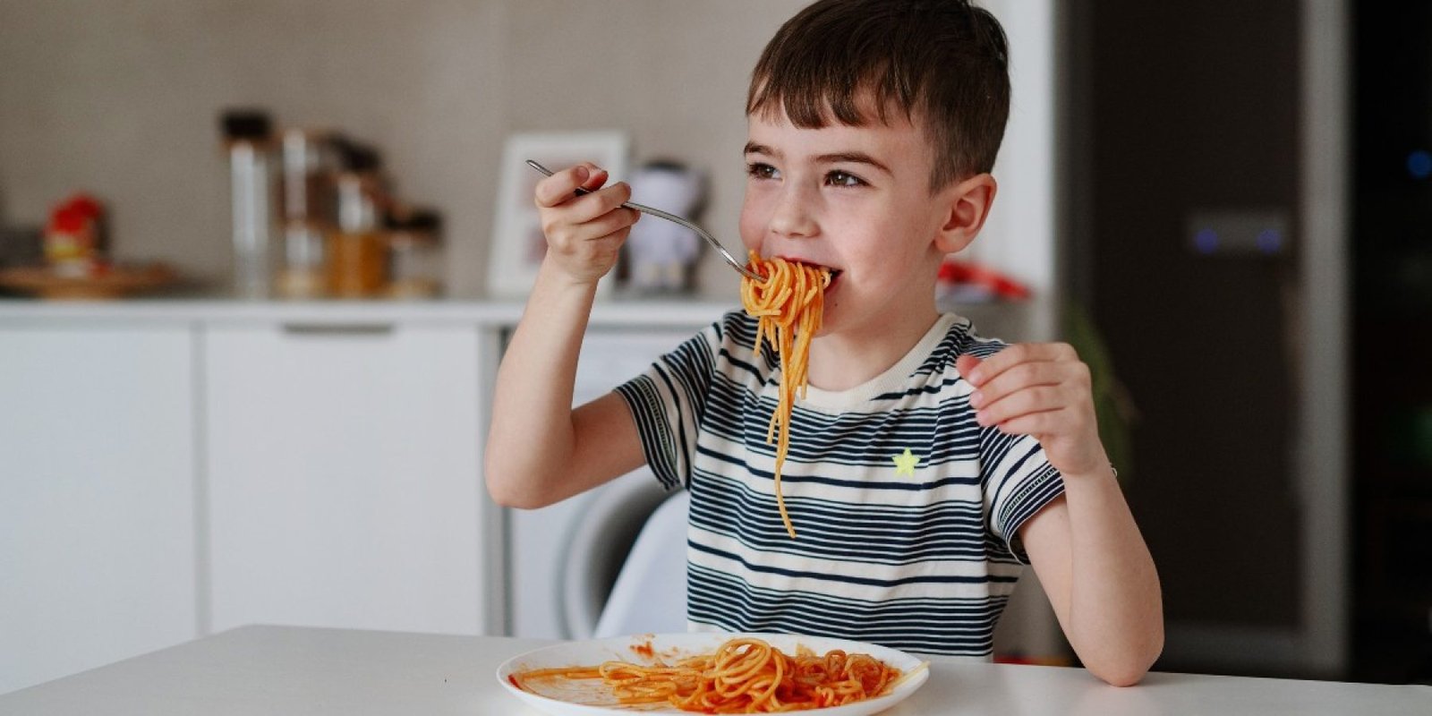 2615202619 child pasta food jpg