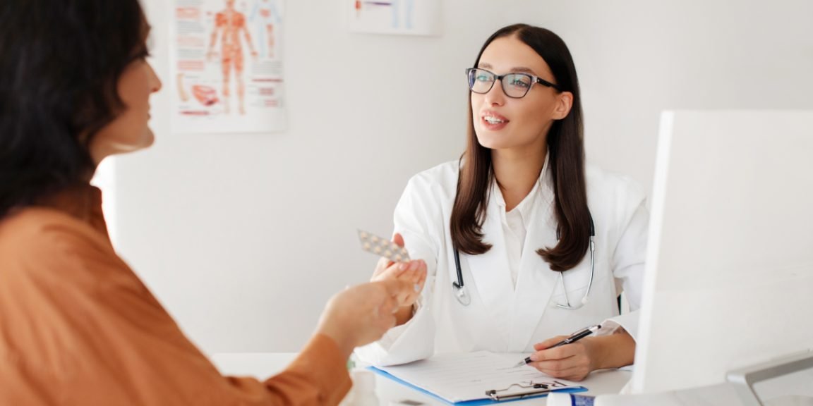 cheerful female doctor shutterstock 2639452615 jpg