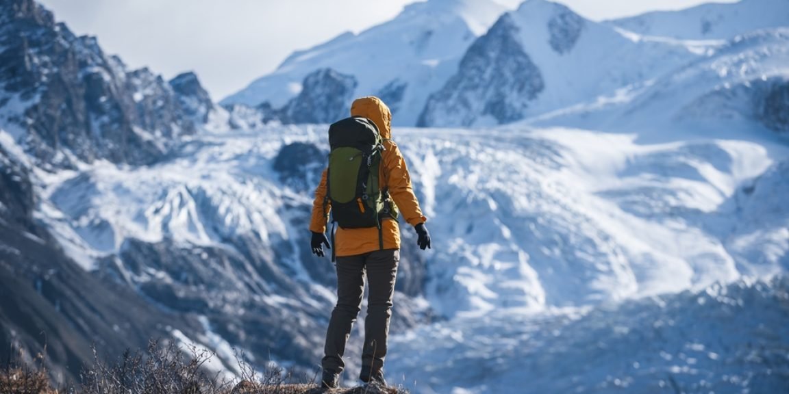 climbing mountain shutterstock 2698969271 jpg