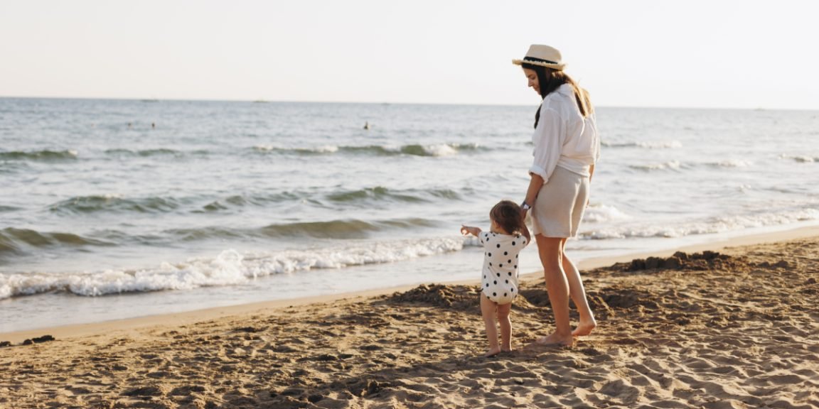 mother with baby summer vacation shutterstock 2739453199 jpg