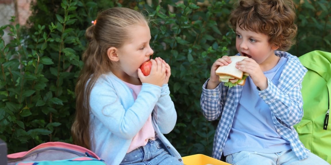 school eating shutterstock 2682231825 jpg