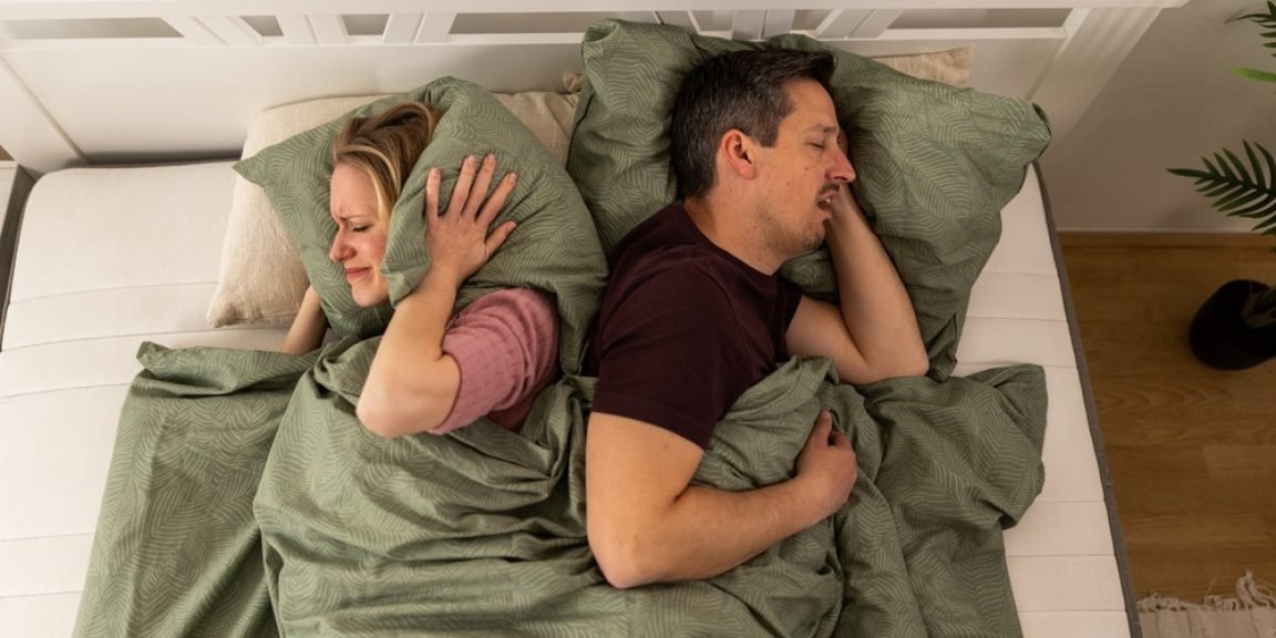 sleep couple ipnos shutterstock 2764886983 jpg