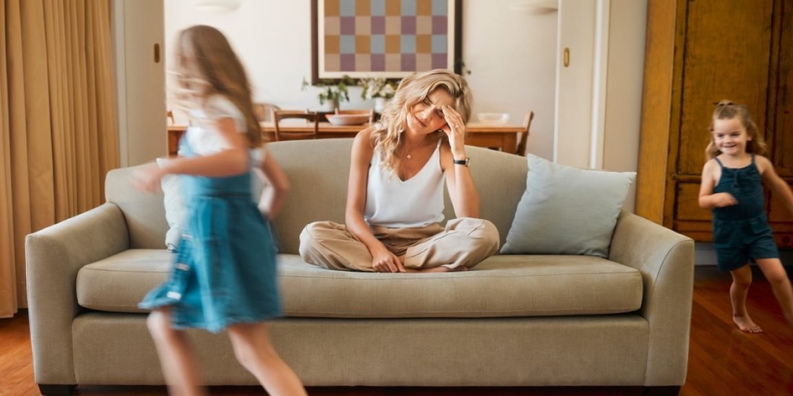 tired mother shutterstock 2572239389 jpg