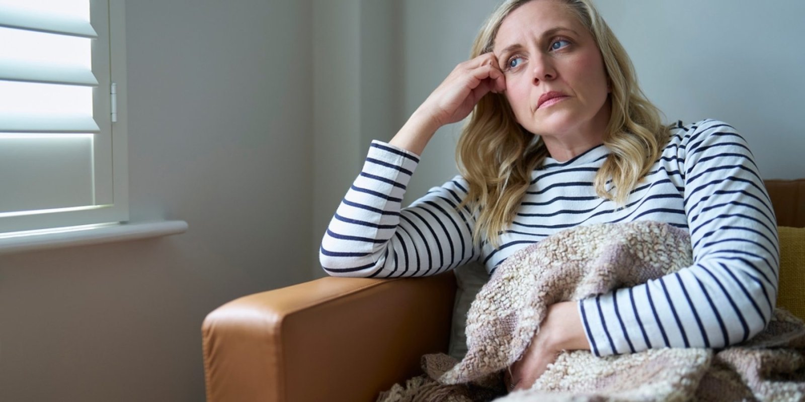 tired woman shutterstock 2460607211 jpg