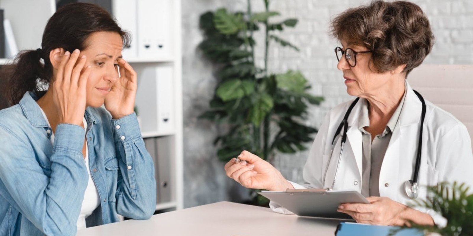 worried patient with her doctor shutterstock 2538177317 jpg