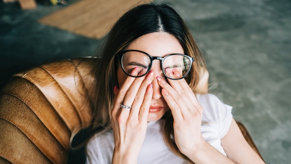 exhausted woman tired shutterstock 2108513678 jpg