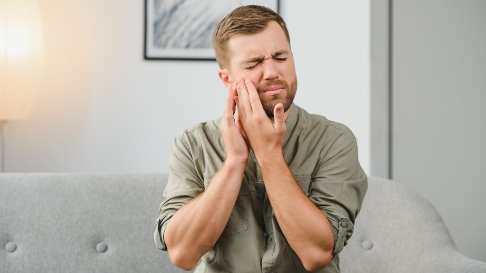 face teeth pain shutterstock 2239222167 jpg