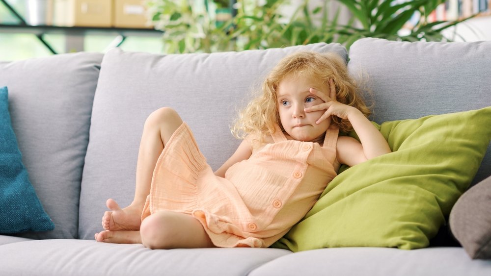 kid bored shutterstock 2186238963 jpg