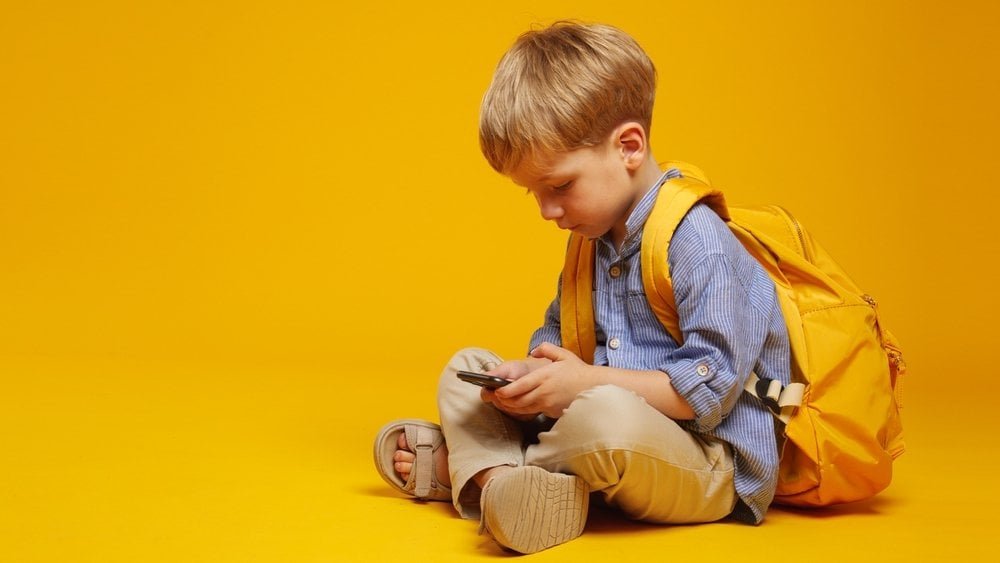 kid smartphone shutterstock 2464736895 jpg