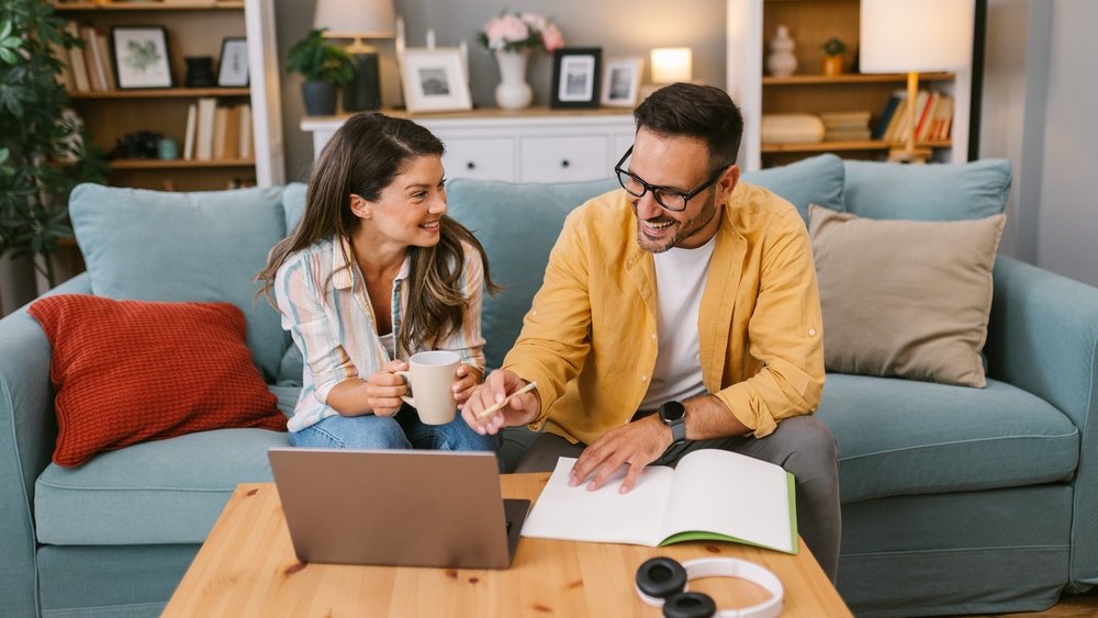 laptop couple shutterstock 2735473879 jpg