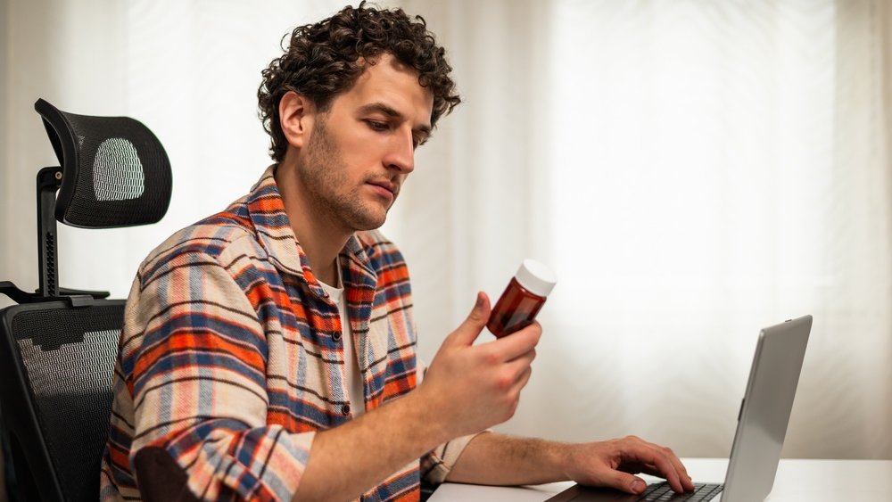 medication laptop shutterstock 2735431479 jpg
