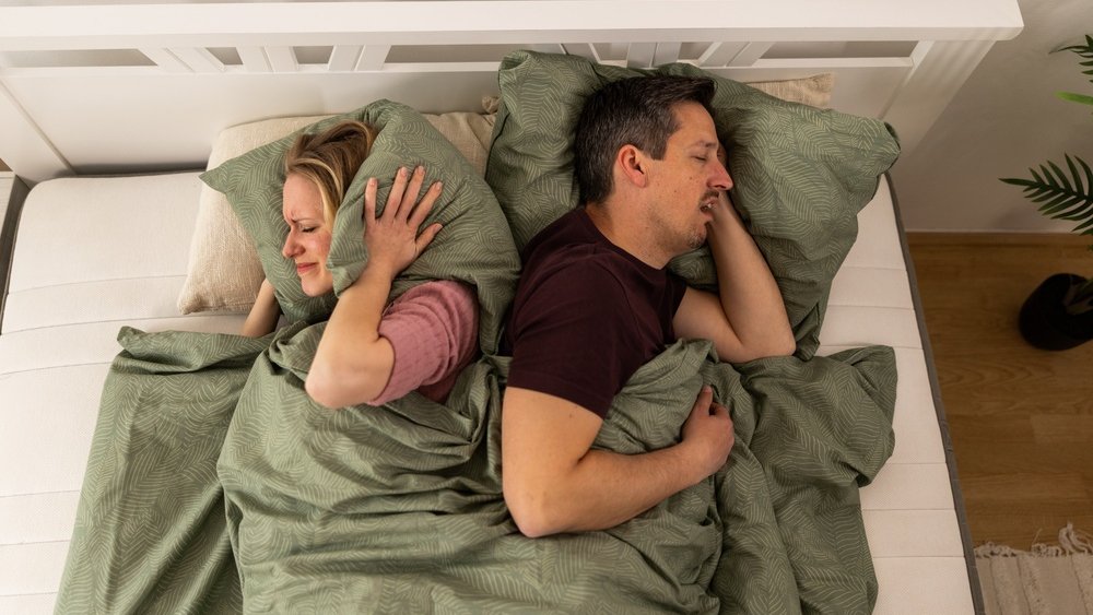 sleep couple ipnos shutterstock 2764886983 jpg